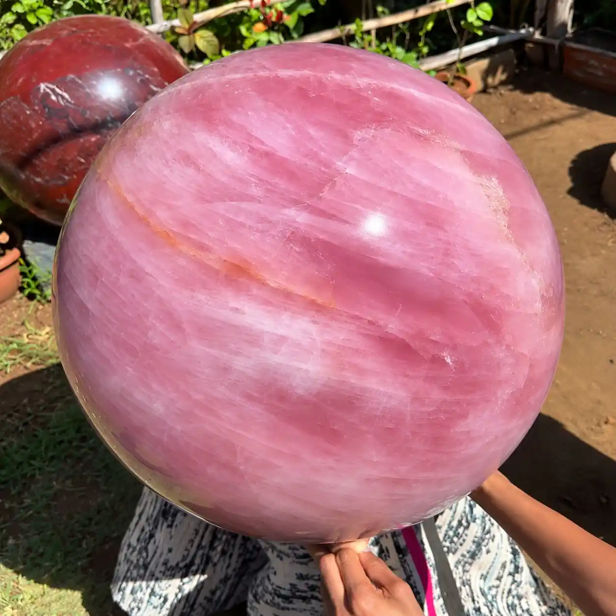 Large natural Rose Quartz Sphere weighing approximately 150 kg with soft pink crystal tones for luxury interior décor and statement display.